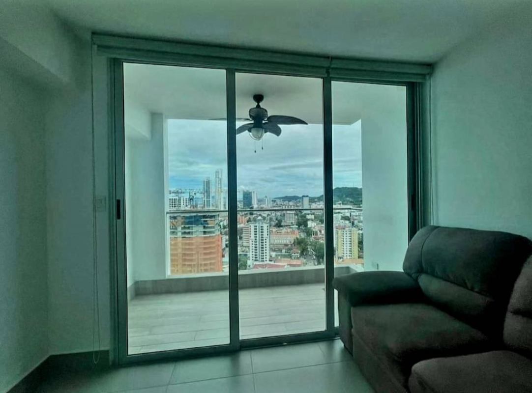 Kitchen with stainless sink, gas stove, microwave, laundry area PH Altamira Residences El Cangrejo Panama