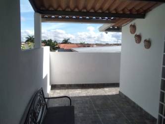 Utility balcony area with AC unit and drain pipe in PH Los Olivos house Panama West
