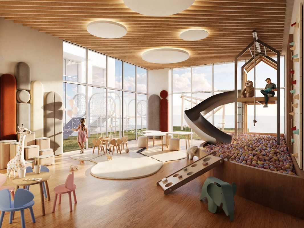 Modern children's playroom with slide, ball pit, climbing wall in PH Costanera luxury condo Panama City