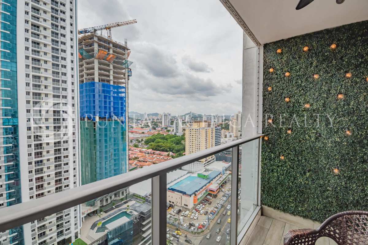 Bright living dining area with balcony, tile floors in PH Torres de Castilla Panama