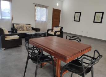 Villa exterior with covered porch and lawn Pedasí Oasis Residences Panama