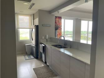 Fully equipped kitchen granite counters stainless steel appliances Laguna Buenaventura condo Panama
