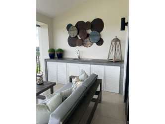 Furnished master bedroom with ensuite bathroom in Laguna Buenaventura apartment Panama