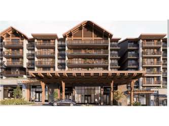 Multi-story alpine condominium Town Boquete complex surrounded by gardens and plaza