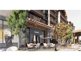 Contemporary commercial space in Town Boquete with shaded outdoor dining and signage