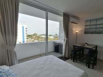 Compact kitchenette with appliances in Town Center Playa Blanca Resort Condo Panama