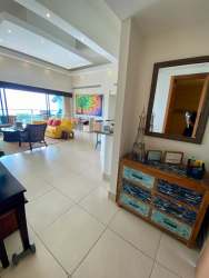 Contemporary kitchen with granite counters, stainless appliances and breakfast bar at Altamar Casamar Panama beachfront apartment