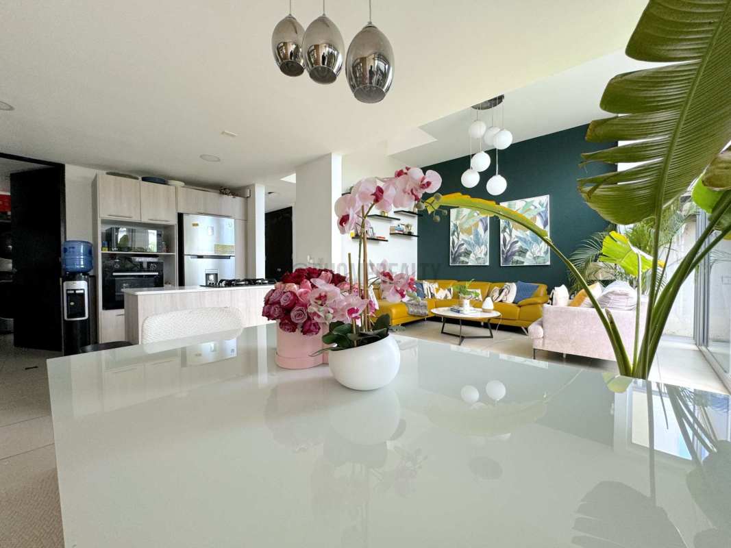 Entrance with large windows, wood steps, and bright open plan Costa Sur Village Panama