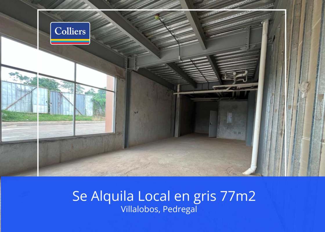 Unfinished interior with exposed ceiling, large windows gray shell space in Plaza Villalobos Pedregal Panama City Panama