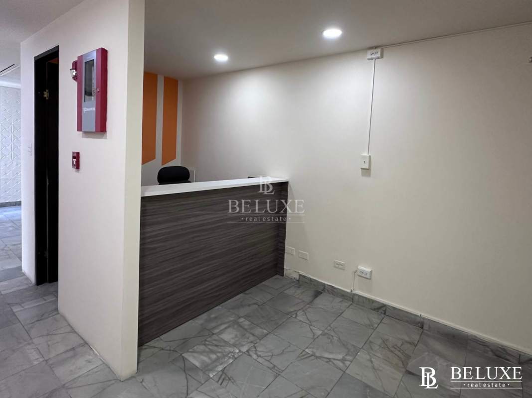 Spacious lobby with sofas reception colorful wall decor Torre BAC Panama