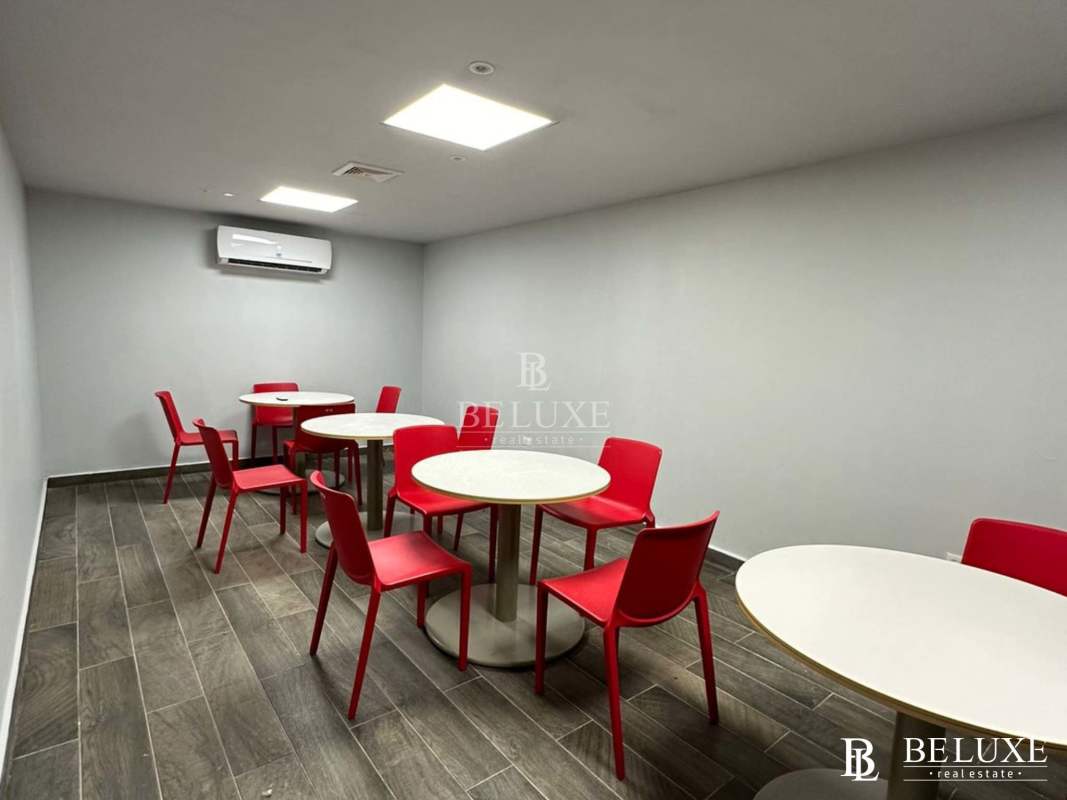 Glass-enclosed private executive office space with city views in Bella Vista