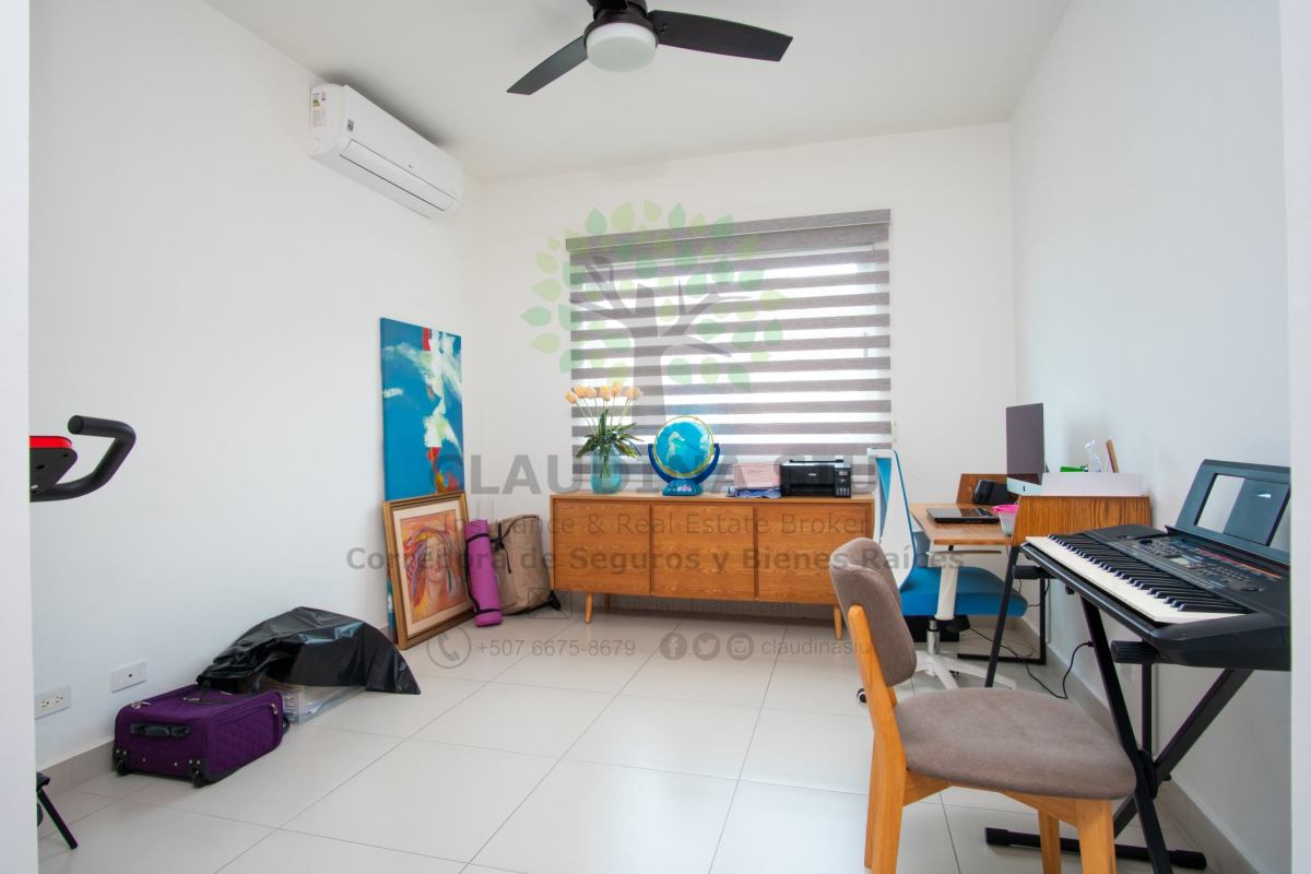 Spacious living and dining room with large windows and terrace access in PH Altos del Parque San Miguelito Panama