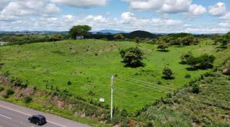 Rolling green hills with distant ocean Guararé Panama ideal for future development