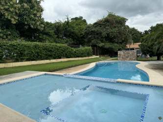 Bedroom with air conditioning ceiling fan PH Tropical Village Punta Barco Panama