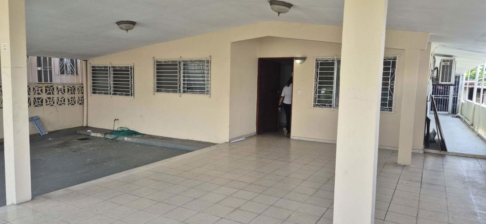 Covered carport with porch, tiled entrance, security bars in Villa Rica near Avenida Balboa Panama City