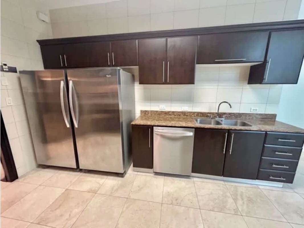 Kitchen with granite countertops, stainless steel fridge, stove, dishwasher PH Ocean Two Costa del Este Panama