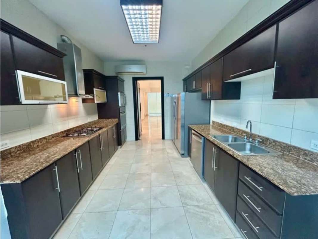 Modern kitchen granite countertop, double sink, dark cabinets, stainless appliances PH Ocean Two Costa del Este