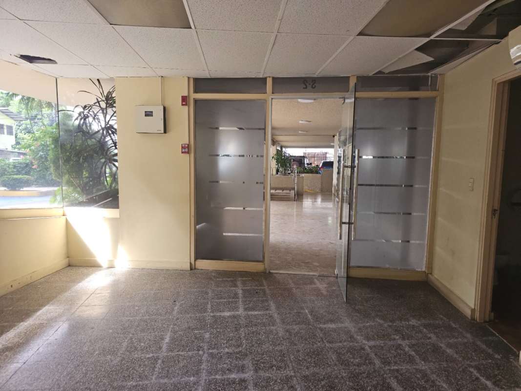 Empty interior of office or shop space with drop ceiling in Torre Comosa Obarrio Panama