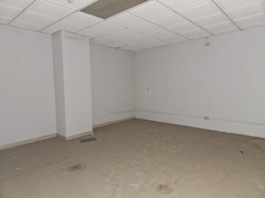 Modern commercial building exterior with glass windows and parking Ofibodegas Las Americas Pacora Panama