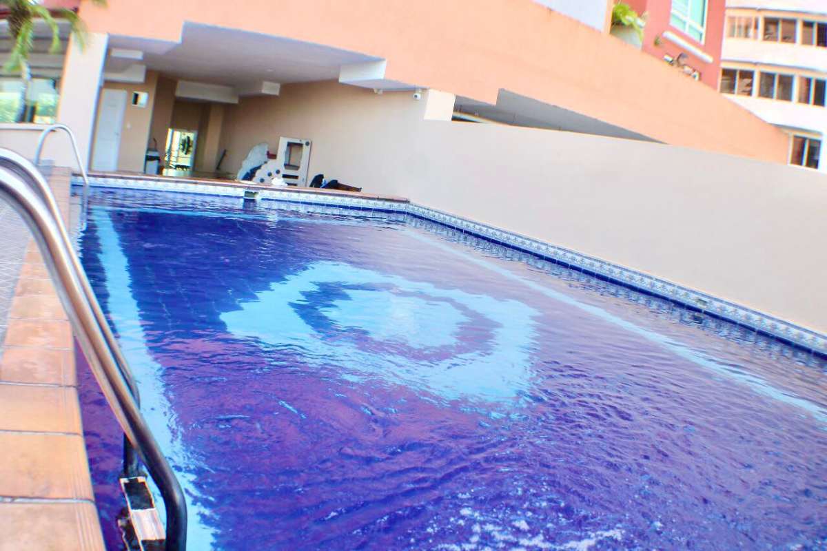 Outdoor pool with deck and shade patio PH Villa de las Fuentes Betania Panama
