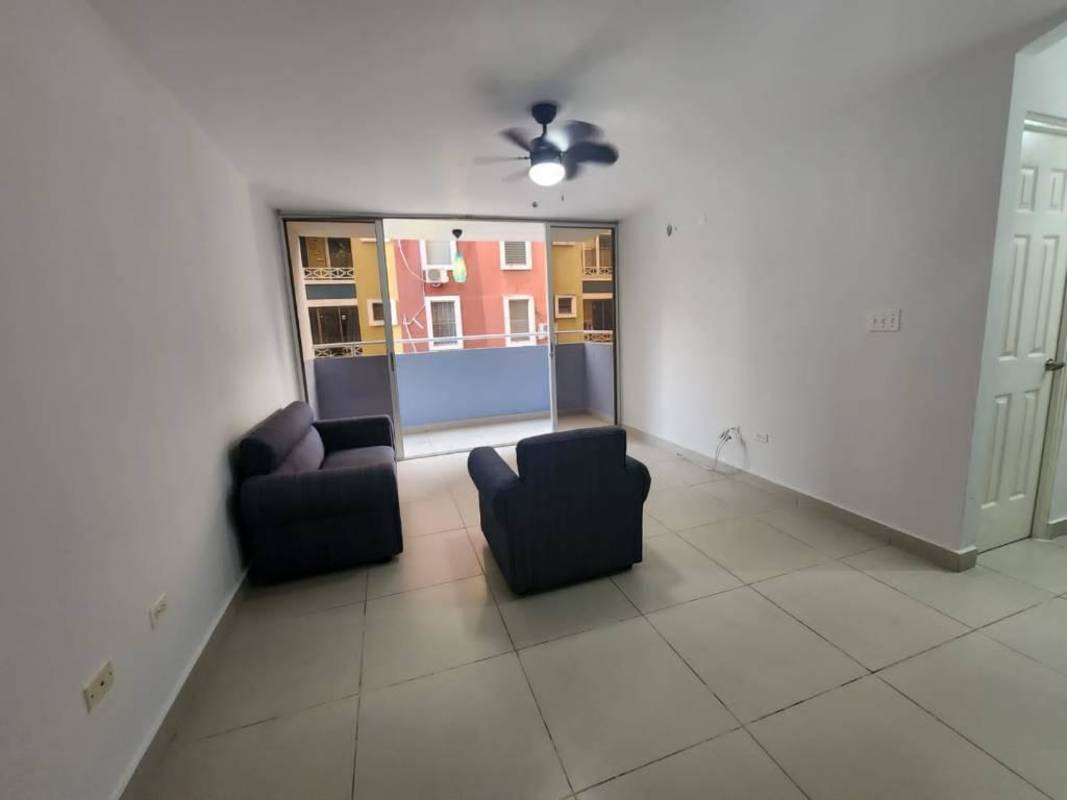 Modern bathroom with shower, vanity and blue accent wall PH Torres de Toscana Panama