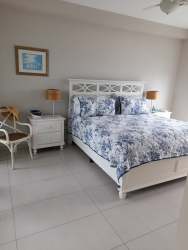 Master bedroom furnished with ocean view from Quarry Heights Bijao Panama