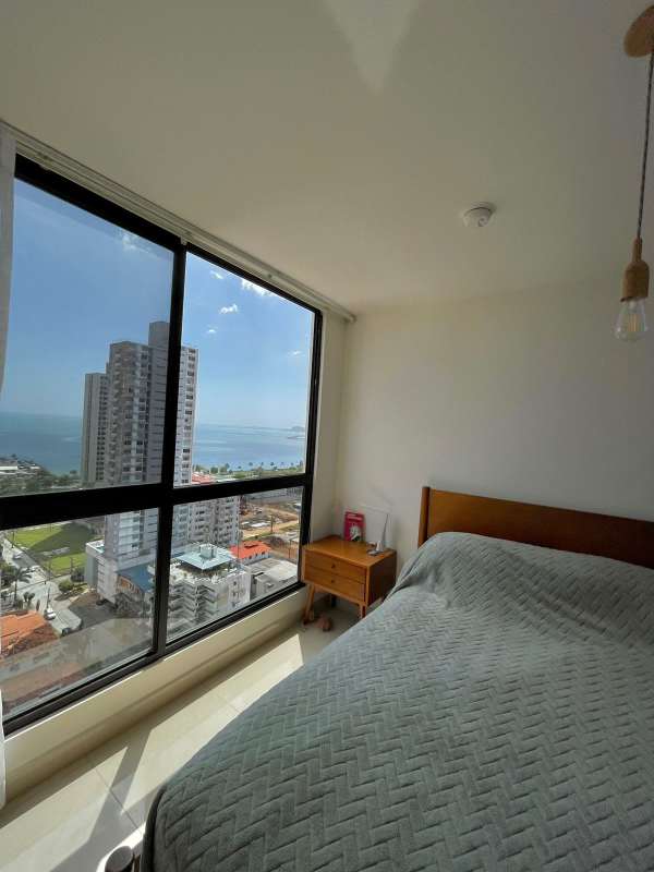 Bedroom with built-in closet and skyline view PH Balboa Bay Panama