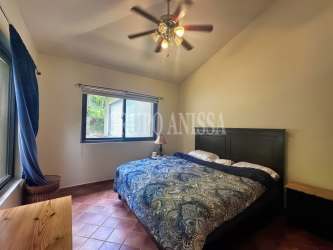 Traditional kitchen with large island and granite countertops in Altos del María Panama