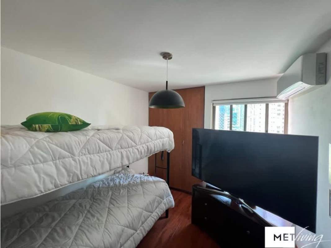 Modern gym with cardio equipment, weights in PH Ocean Club Panama City