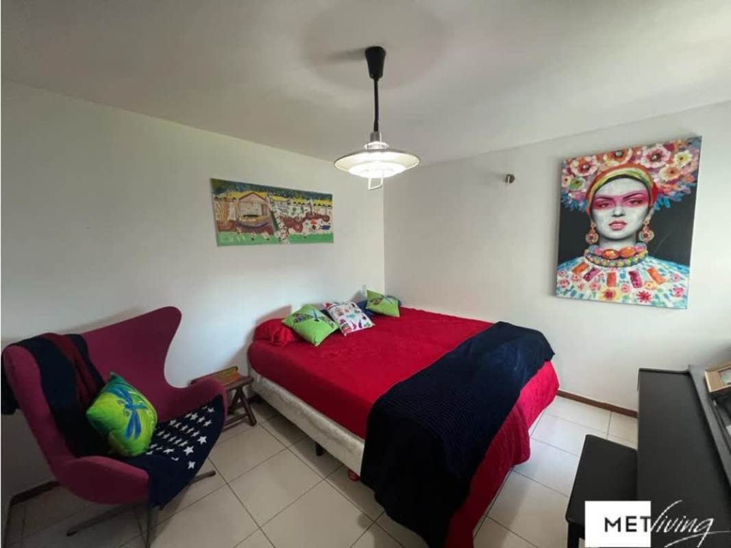 Kitchen in PH Ocean Club with wood cabinetry, modern appliances, tile backsplash