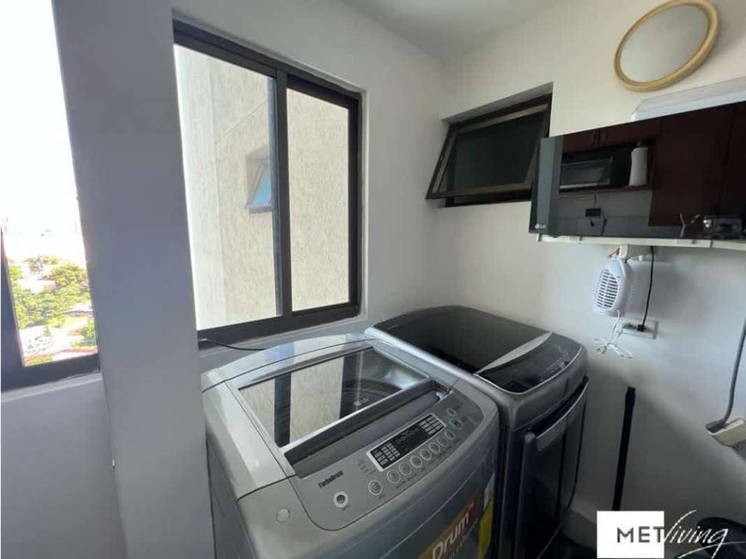 Modern playground with slides, swings near high-rise tower PH Ocean Club Punta Pacifica