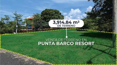 Large vacant flat lot with mature trees and grass in Punta Barco luxury resort near Coronado Panama