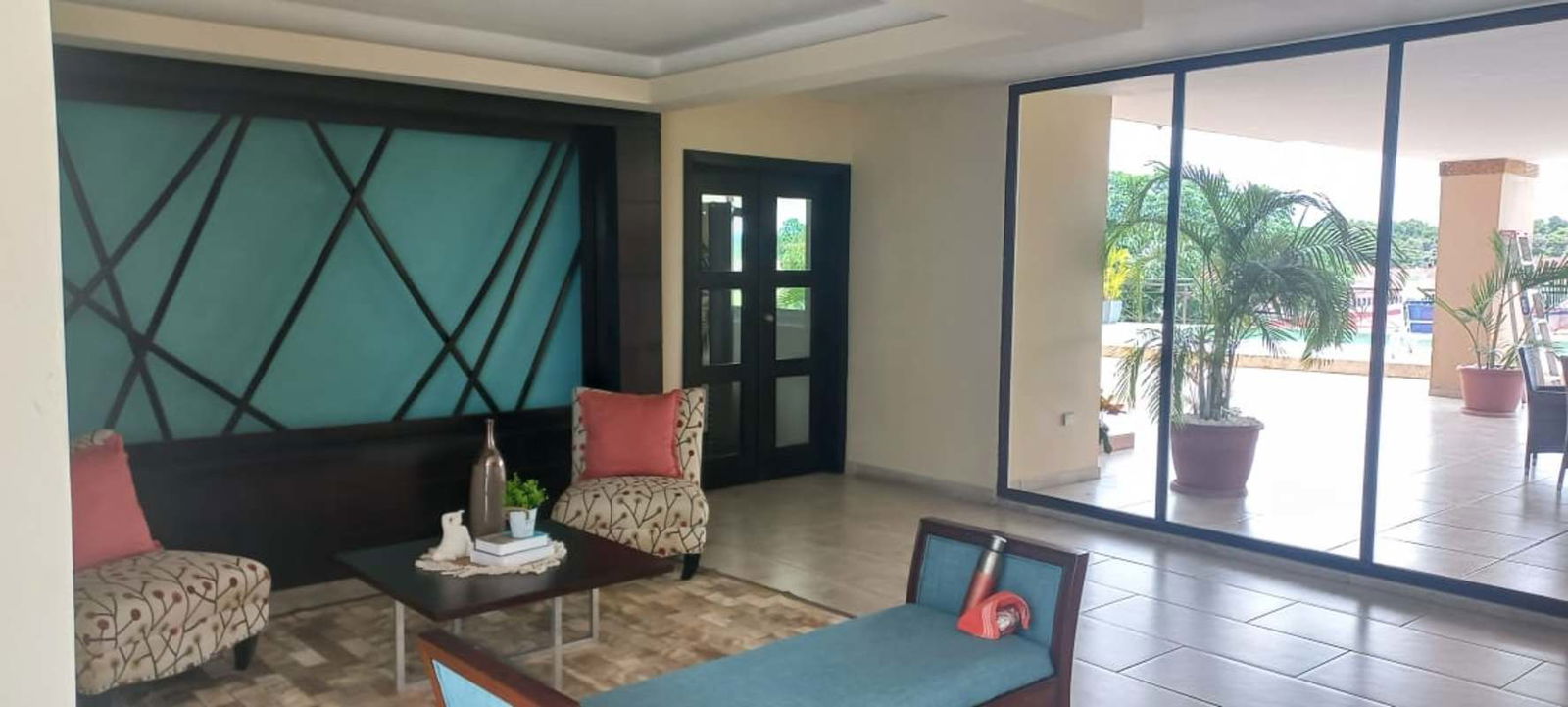 Family room and dining space with tile floors and natural light PH Pine Hill Panama City