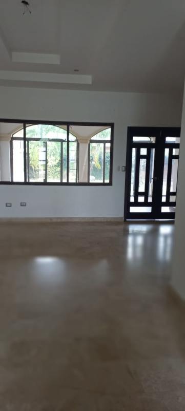 Main bathroom with jacuzzi tub, marble tiles, large window Sunset Coast Costa Sur home Panama