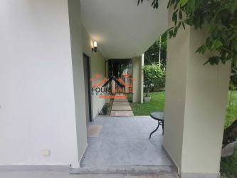 Bright open-plan living dining room with large windows PH Nativa Panama Pacifico