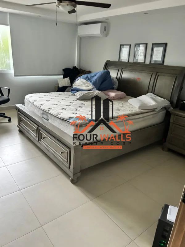 Spacious bedroom with ceiling fan, tiled floor at PH Diplomático Obarrio