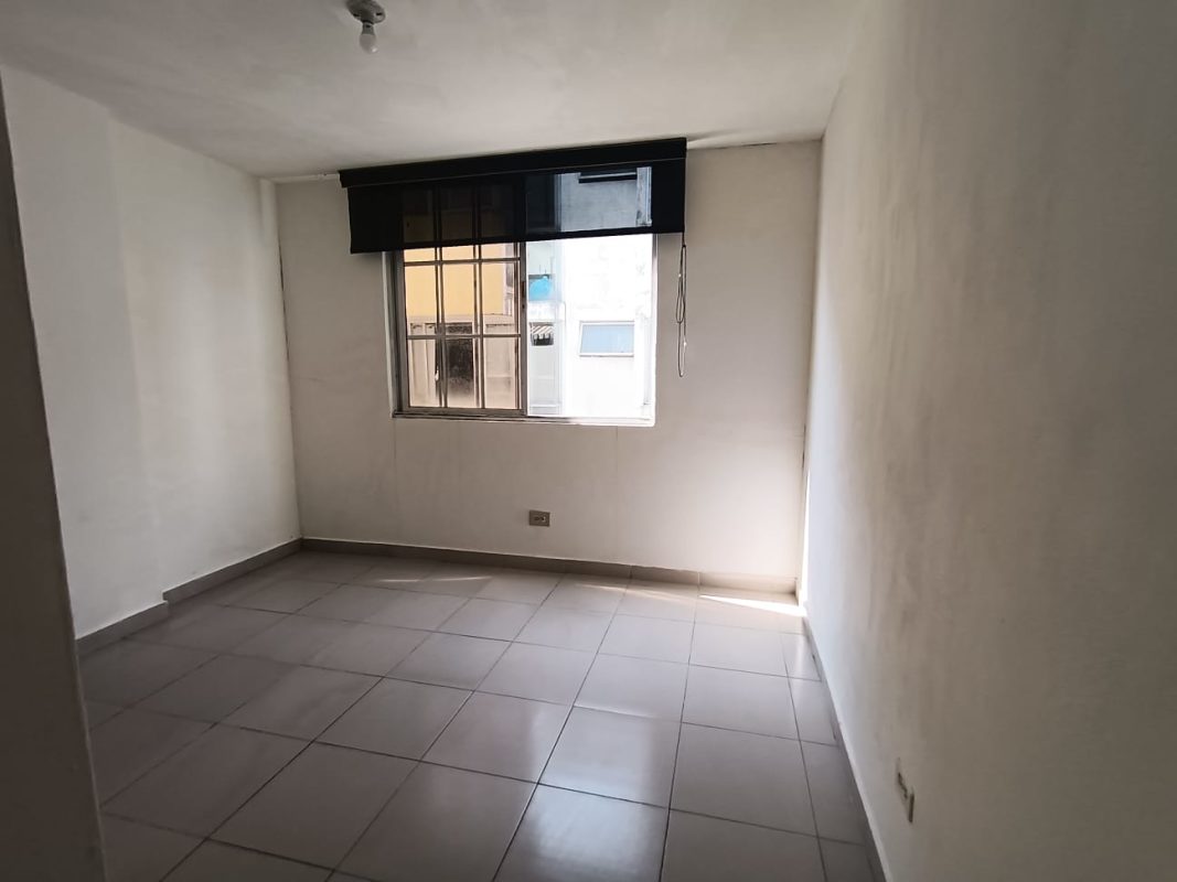 Empty bright bedroom tiled floors window PH Mystic Park affordable Panama apartment