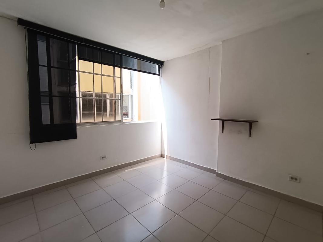 Bedroom with large window tiled floor built-in shelf PH Mystic Park Juan Diaz Panama