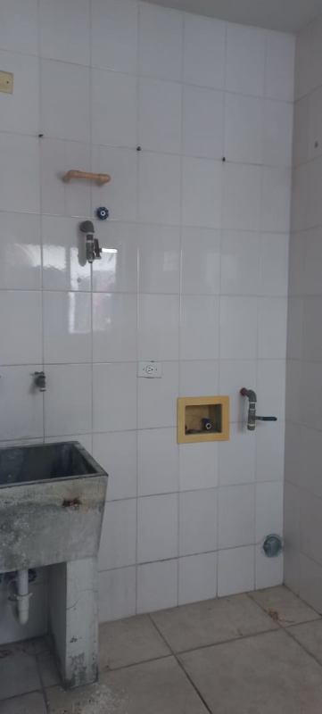 Laundry space with sink and washer hookups in Lexington Tower apartment Betania Panama