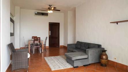 Open plan living and dining space with terrace access, Vista Mar condo Panama