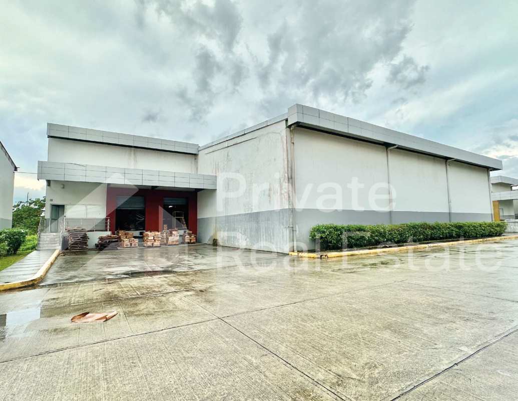 Loading dock area with metal awning concrete driveway Tocumen Storage Complex