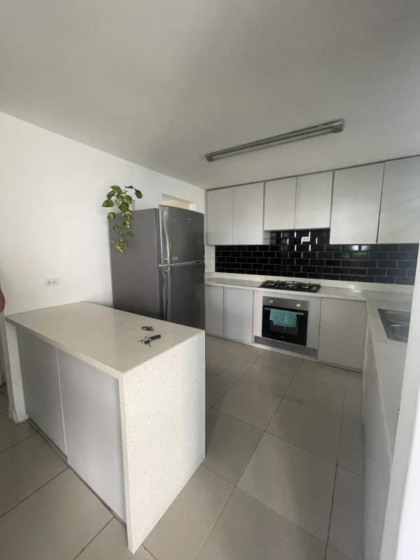 Bright living and dining open area with windows city views at Edison Park Panama