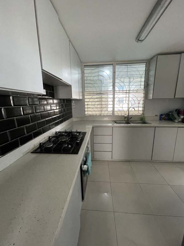 Upgraded kitchen with granite counters, cabinets, stove and window PH Belview Towers Edison Park