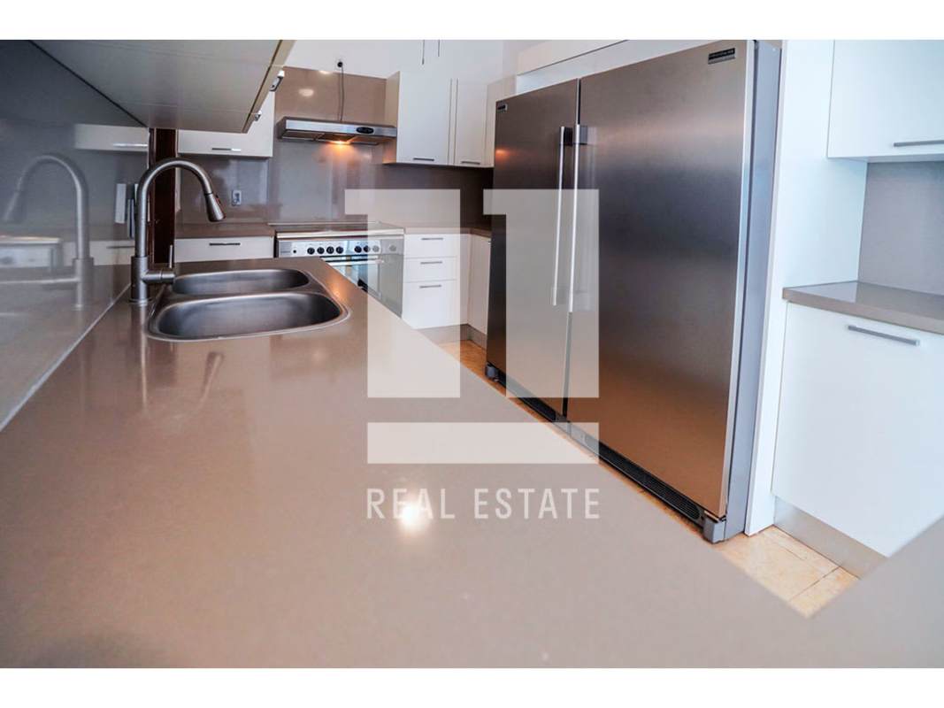 Spacious balcony with glass railing overlooking golf course at PH Greenview Santa Maria Panama