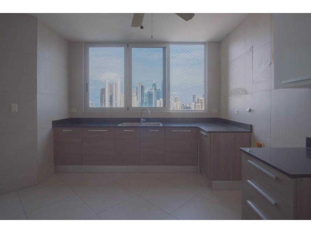 Kitchen with modern cabinetry large windows city view in PH Luxor Tower Panama City