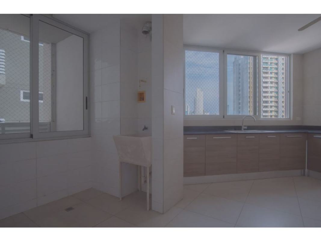 Modern kitchen with large windows cabinetry laundry sink PH Luxor Tower Panama City