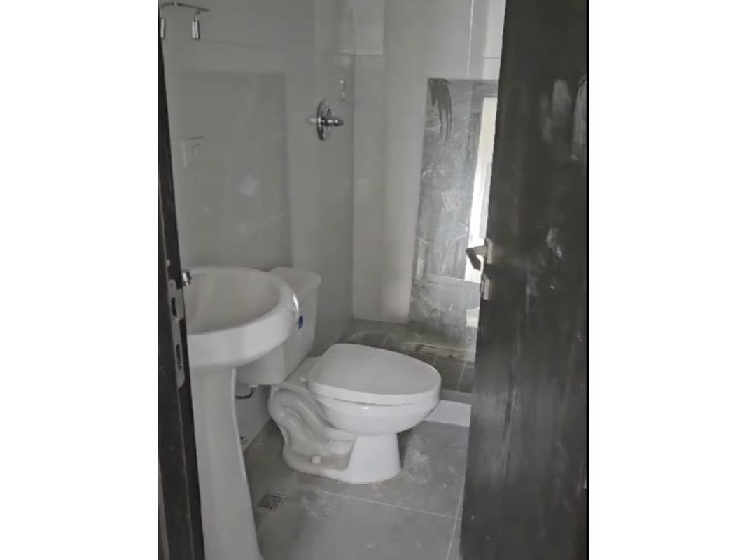 Bedroom with large window and city skyline at Seapoint Punta Paitilla