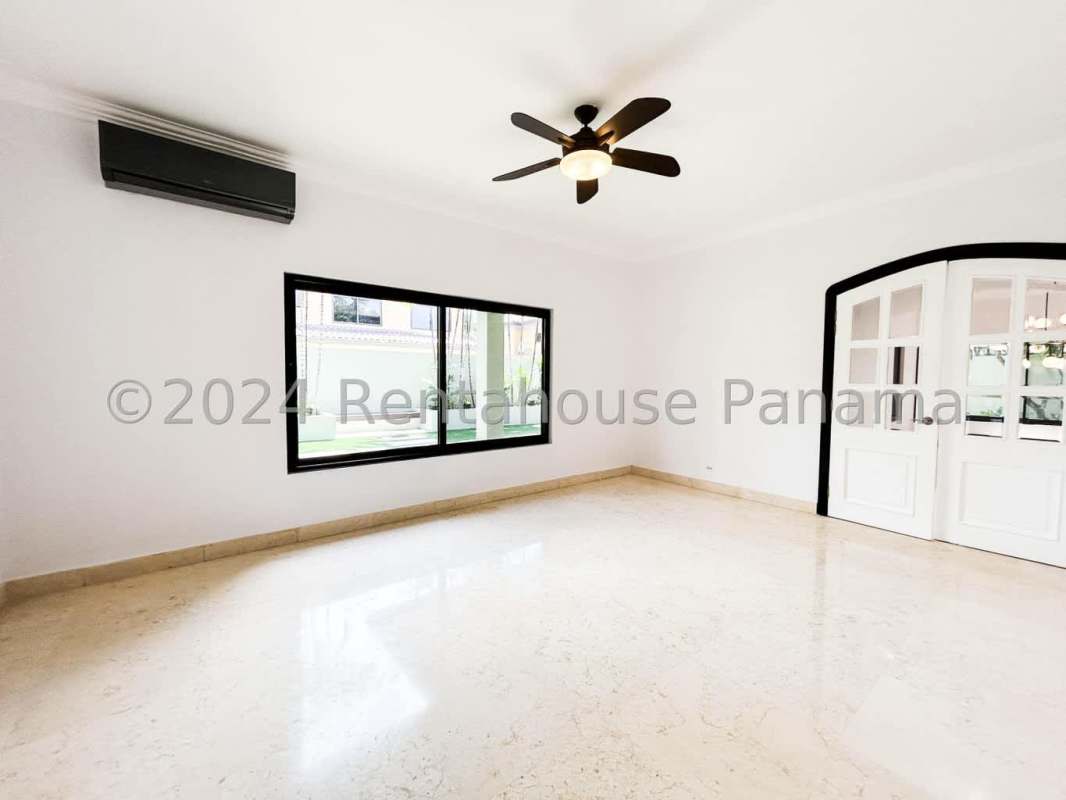 Spacious kitchen featuring island, stainless steel appliances, marble floors in luxury home PH Antigua Costa del Este