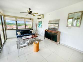 Master bedroom large window, AC unit, closet, balcony view in PH Woodland Panama Pacifico