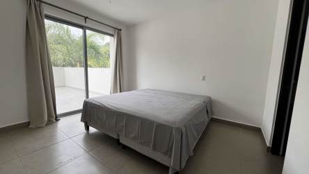 Bedroom with large window and modern finishes at PH Mosaic Panama